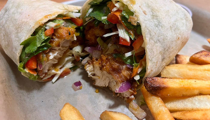 Wrap with steak and fries on the side from Stellar 181 Taphouse