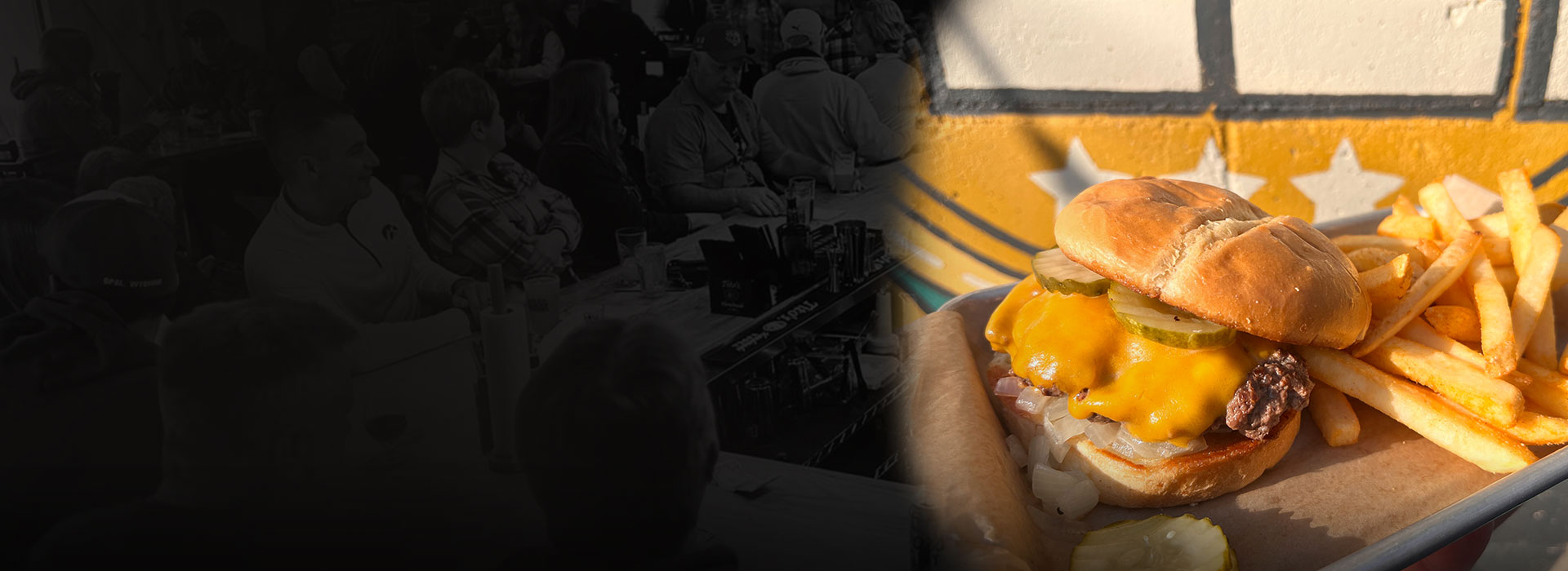 Steller 181 Taphouse Burger with Fries background of bar